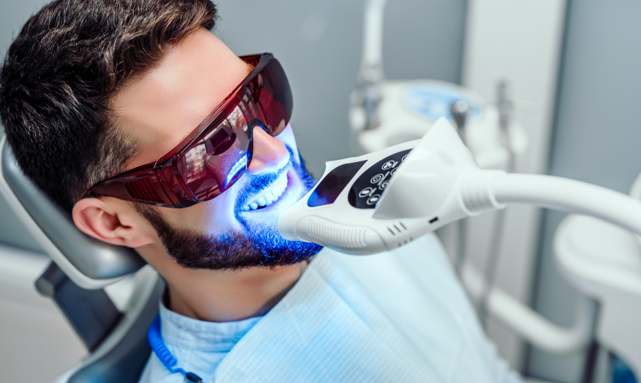 Man getting teeth whitening treatment